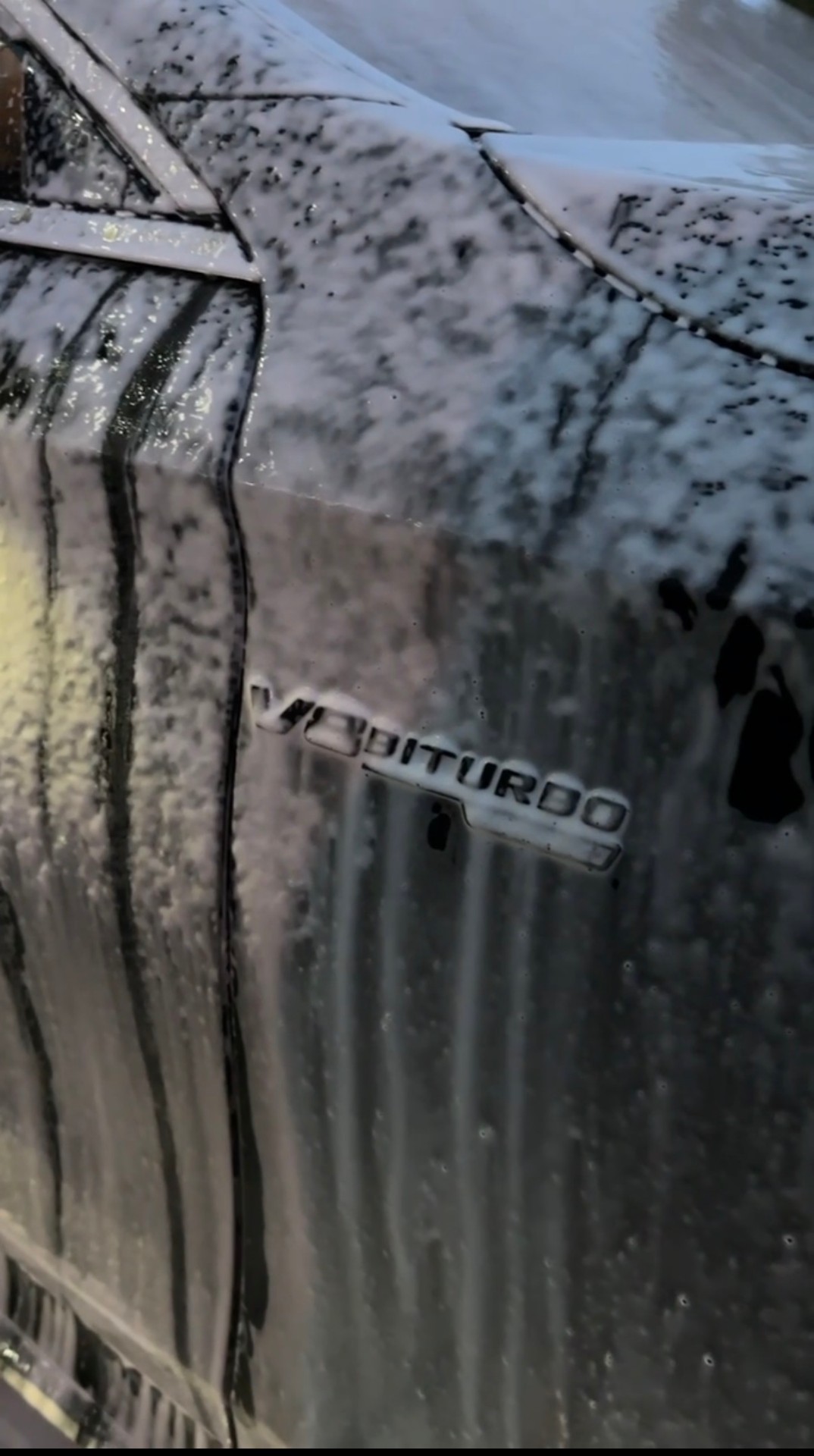 V8 BiTurbo badge during foam wash